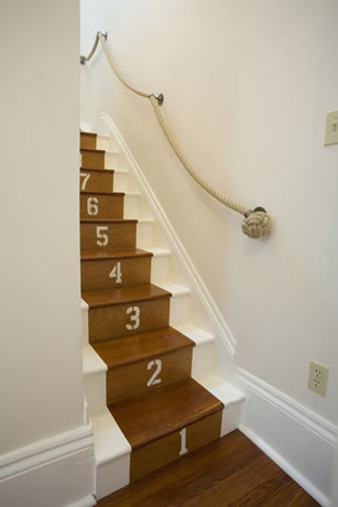 staircase rope handrail and painted numbers