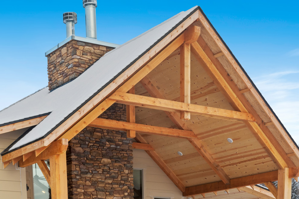 Inspiration for a large rustic white two-story concrete fiberboard and board and batten house exterior remodel with a butterfly roof, a shingle roof and a gray roof