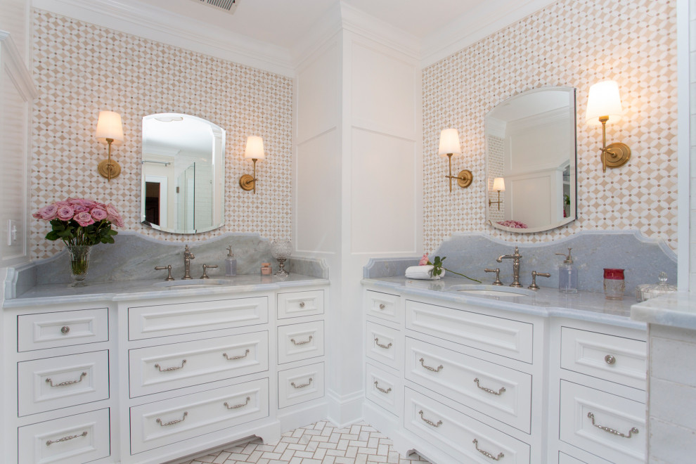 Large traditional master bathroom in Milwaukee with medium wood cabinets, an undermount sink, a double vanity, recessed-panel cabinets, multi-coloured tile, marble floors, marble benchtops, grey benchtops and a built-in vanity.