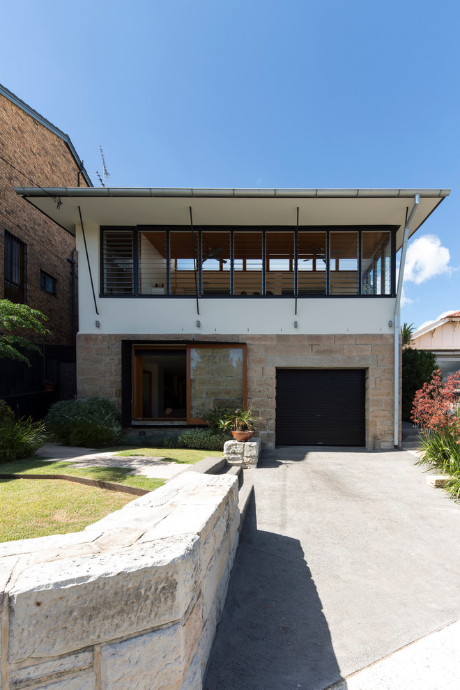 This is an example of a contemporary two-storey white exterior in Sydney.