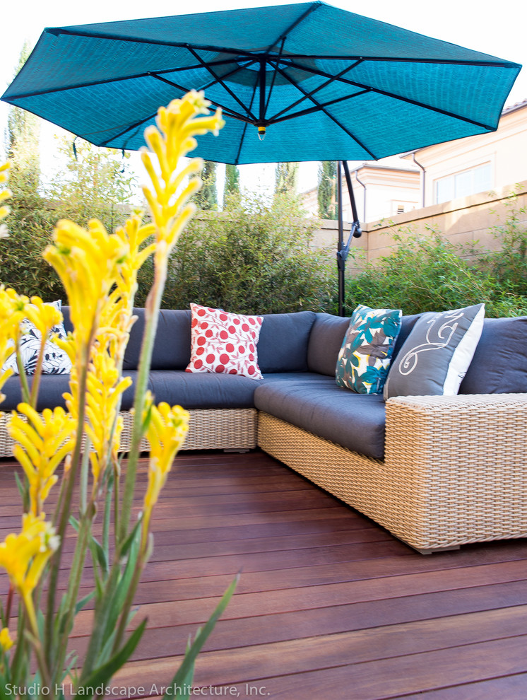 Inspiration for a small contemporary backyard deck in Orange County.