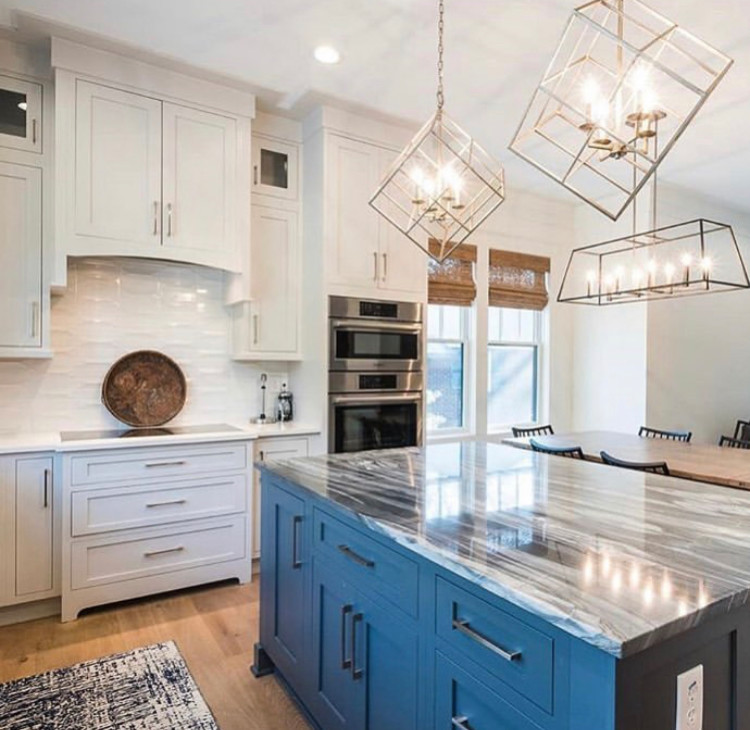 Inspiration for a contemporary eat-in kitchen remodel with an island