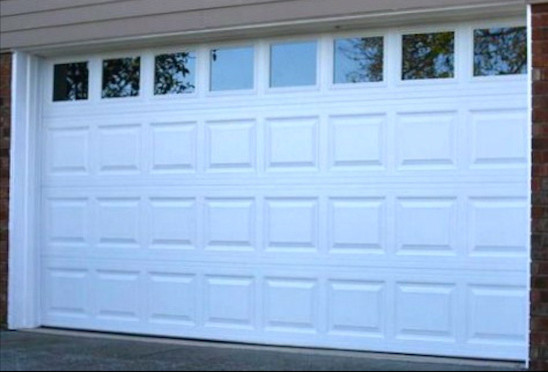 Garage - large attached one-car garage idea in Nashville