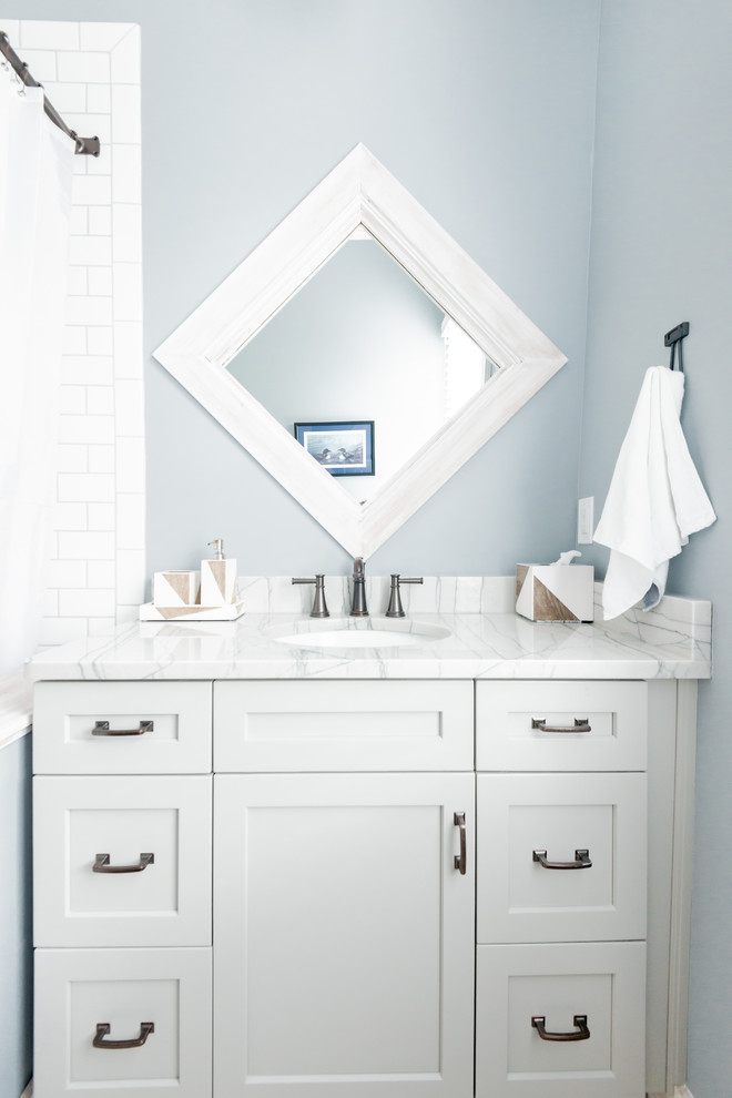 Design ideas for a contemporary bathroom in Charleston with shaker cabinets and grey cabinets.