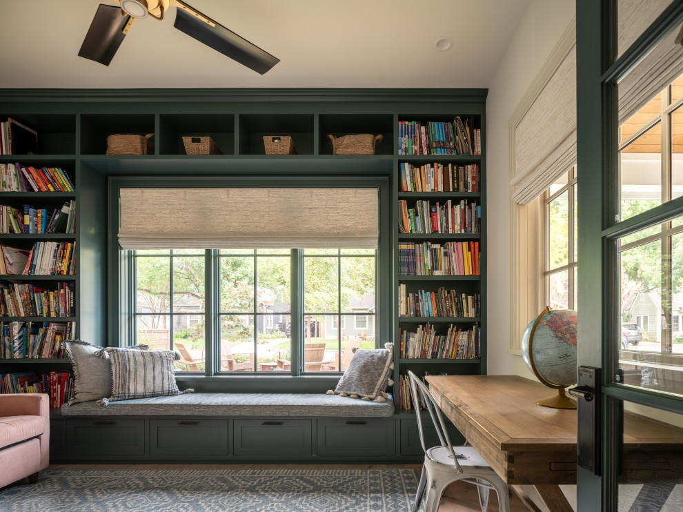 Ramsey House - Example of a country light wood floor, beige floor and vaulted ceiling home office library design in Austin with white walls