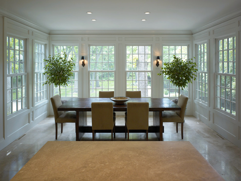 Example of a large transitional porcelain tile and multicolored floor enclosed dining room design in Cedar Rapids with white walls and no fireplace