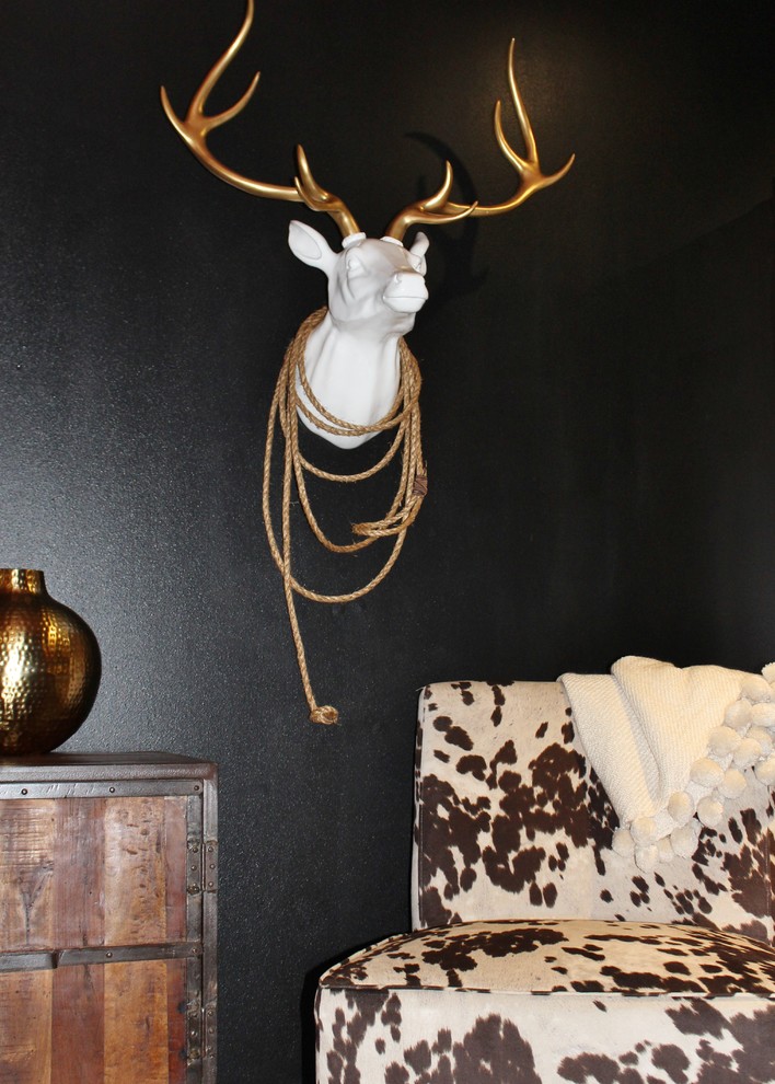 Inspiration for a rustic home design remodel with black walls