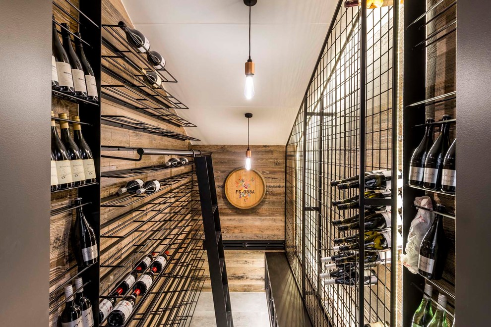 Design ideas for a contemporary wine cellar in Brisbane with storage racks.