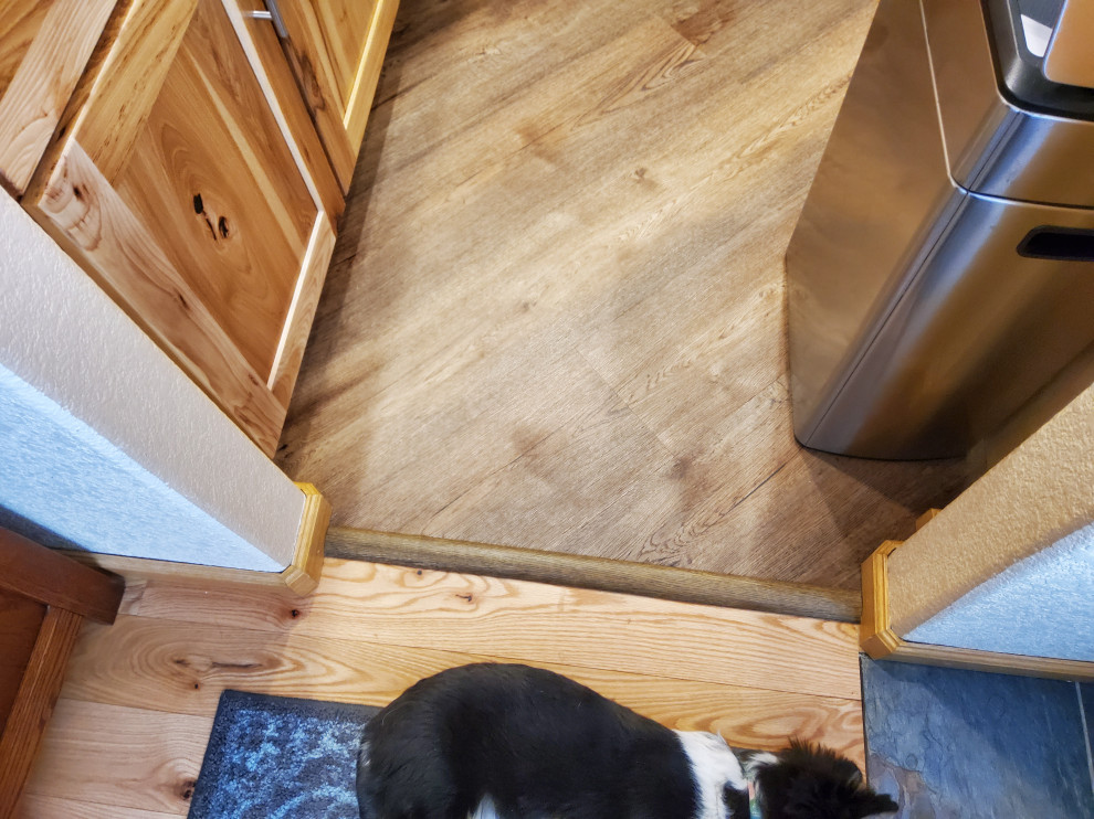 Color/material of transition threshold between rooms?