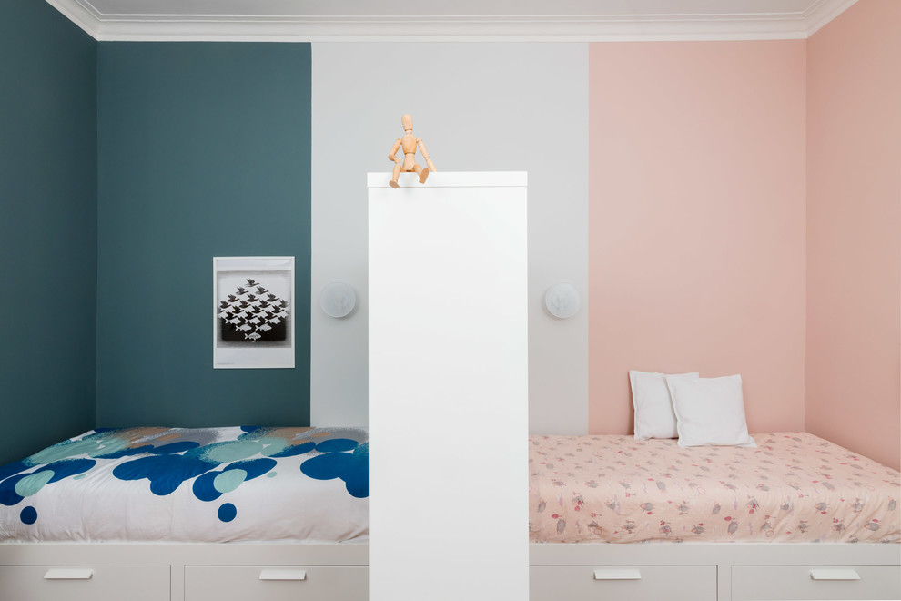 Inspiration for a mid-sized scandinavian gender-neutral kids' bedroom in Milan with multi-coloured walls.