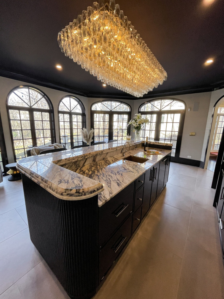 Photo of an expansive transitional galley seated home bar in Chicago with an integrated sink, shaker cabinets, black cabinets, beige floor and multi-coloured benchtop.