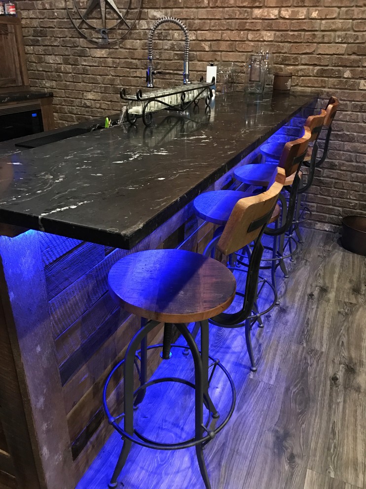 Photo of an industrial home bar in Atlanta.