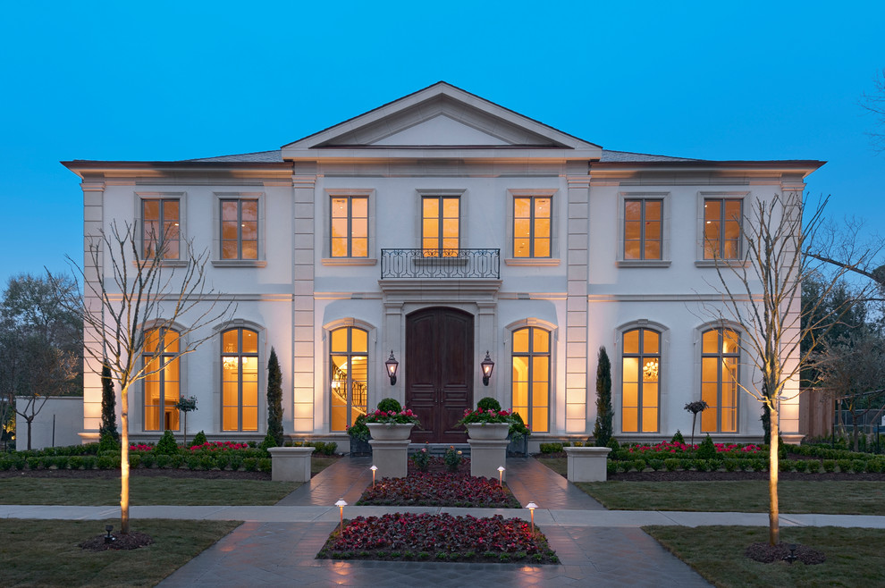 This is an example of a traditional two-storey white exterior in Houston.