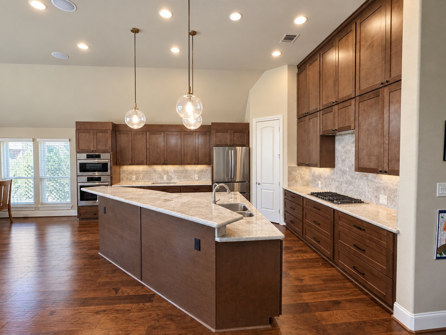 Contemporary Kitchen Remodel with Oversized Island in Cypress, TX