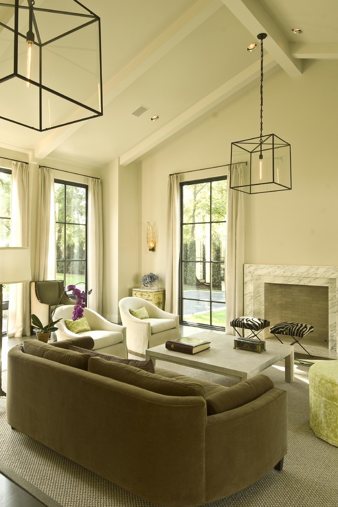 Design ideas for a transitional living room in Dallas with beige walls and a standard fireplace.
