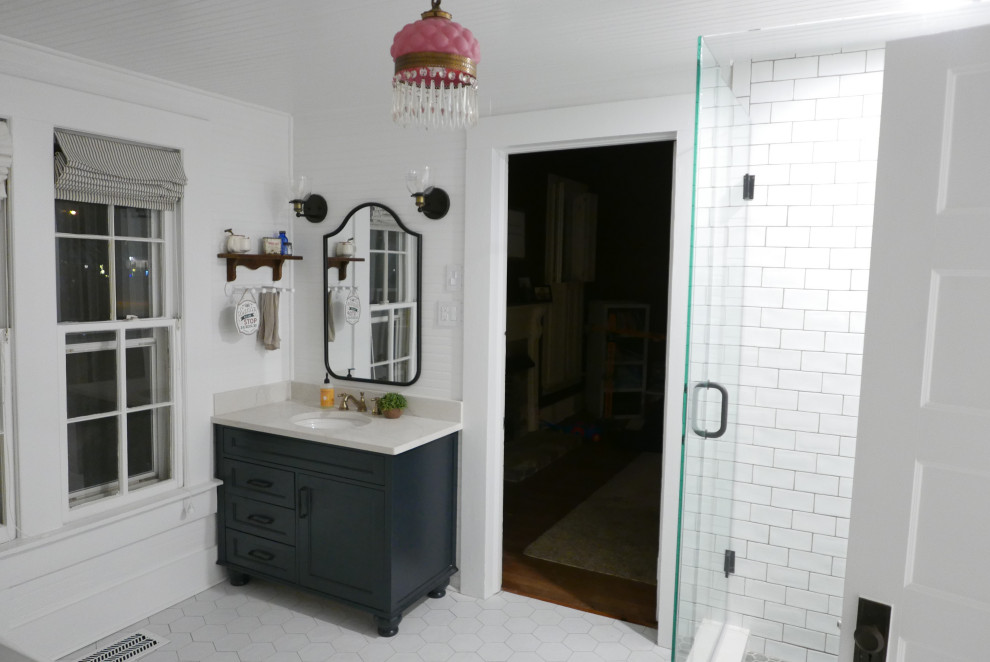 Example of a mid-sized classic kids' white tile and ceramic tile porcelain tile, white floor, single-sink, wood ceiling and wood wall bathroom design in Other with furniture-like cabinets, blue cabinets, a two-piece toilet, white walls, an undermount sink, quartz countertops, a hinged shower door, white countertops and a freestanding vanity