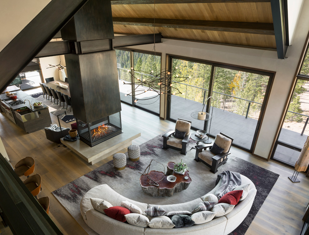 Example of a mountain style home design design in Denver