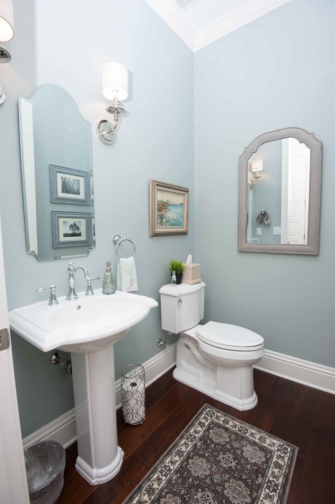 This is an example of a traditional powder room in Orlando.