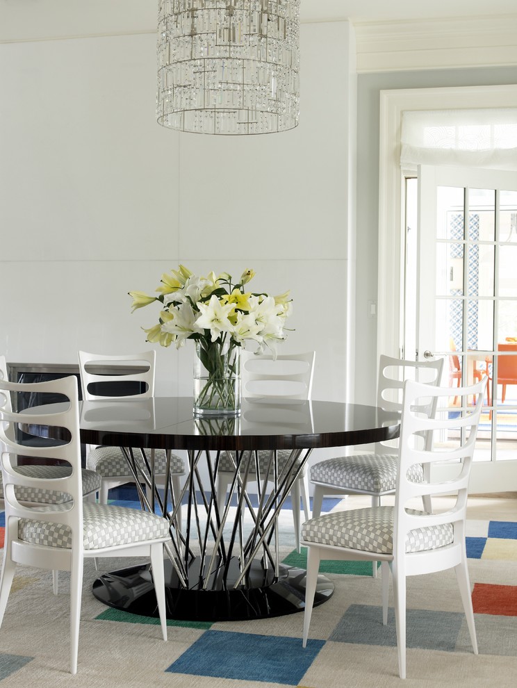 Design ideas for a transitional dining room in New York with white walls.
