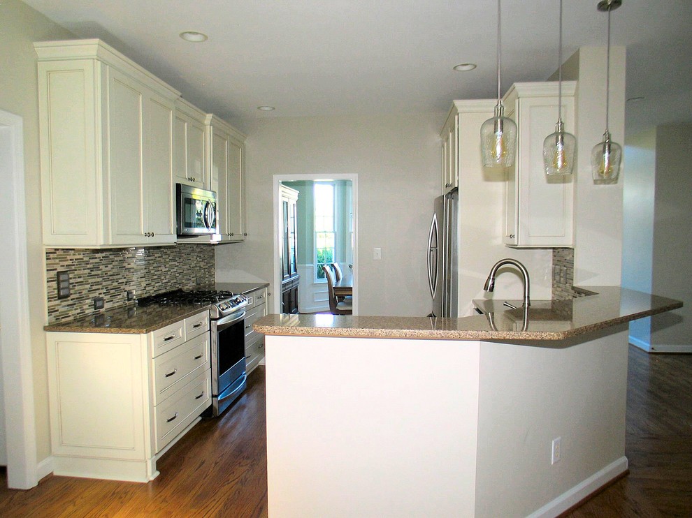 Example of a transitional kitchen design in Raleigh