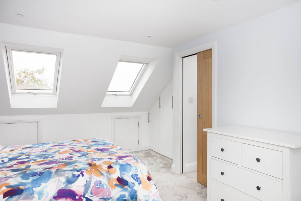 Photo of a modern bedroom in Surrey.