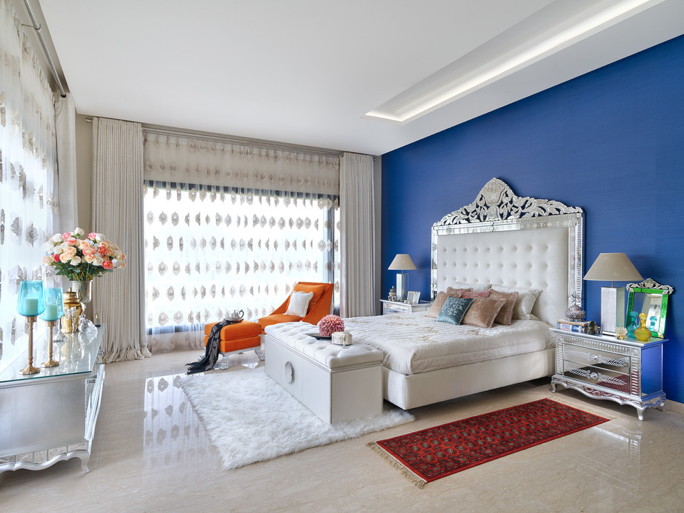 Large eclectic master bedroom in Other with beige floor and marble floors.