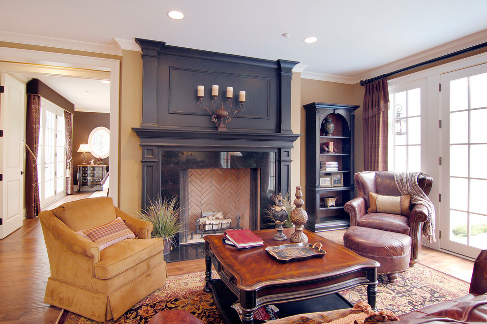 Inspiration for an arts and crafts open concept family room in Chicago with medium hardwood floors and a stone fireplace surround.