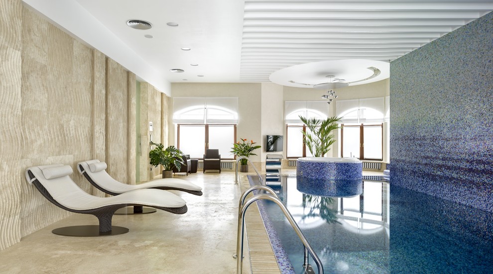 Inspiration for a large contemporary indoor rectangular pool in Moscow with a hot tub.