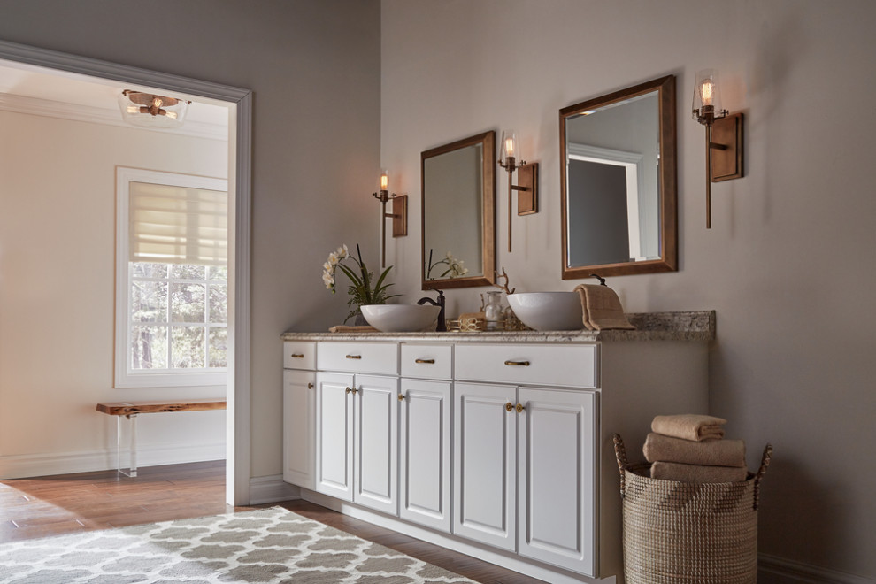 Design ideas for a large transitional bathroom in Other with raised-panel cabinets, white cabinets, beige walls, medium hardwood floors, a console sink, granite benchtops, brown floor, a double vanity and a built-in vanity.