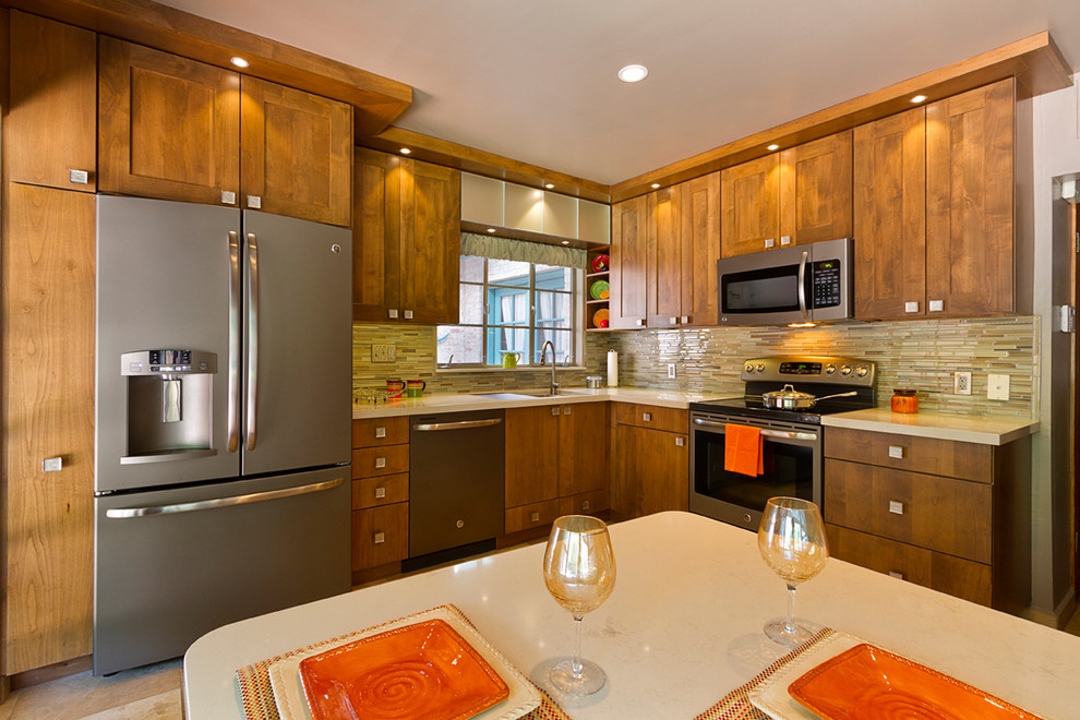 Inspiration for a mid-sized transitional l-shaped enclosed kitchen remodel in Phoenix with an undermount sink, flat-panel cabinets, medium tone wood cabinets and quartz countertops
