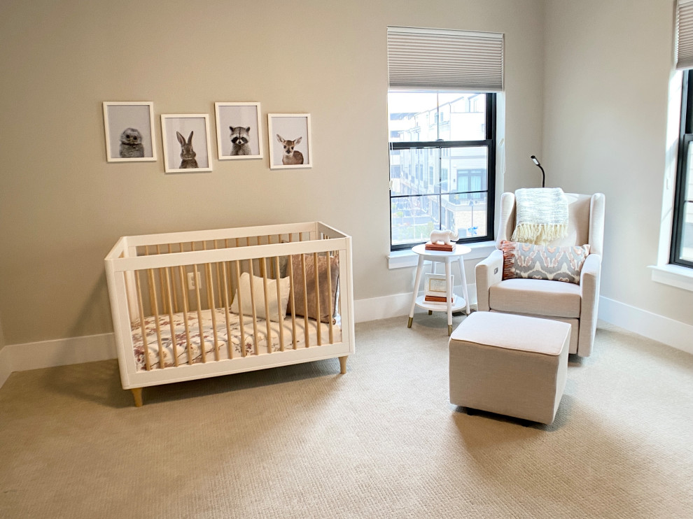 Design ideas for a large contemporary gender-neutral nursery in DC Metro with beige walls, carpet and white floor.