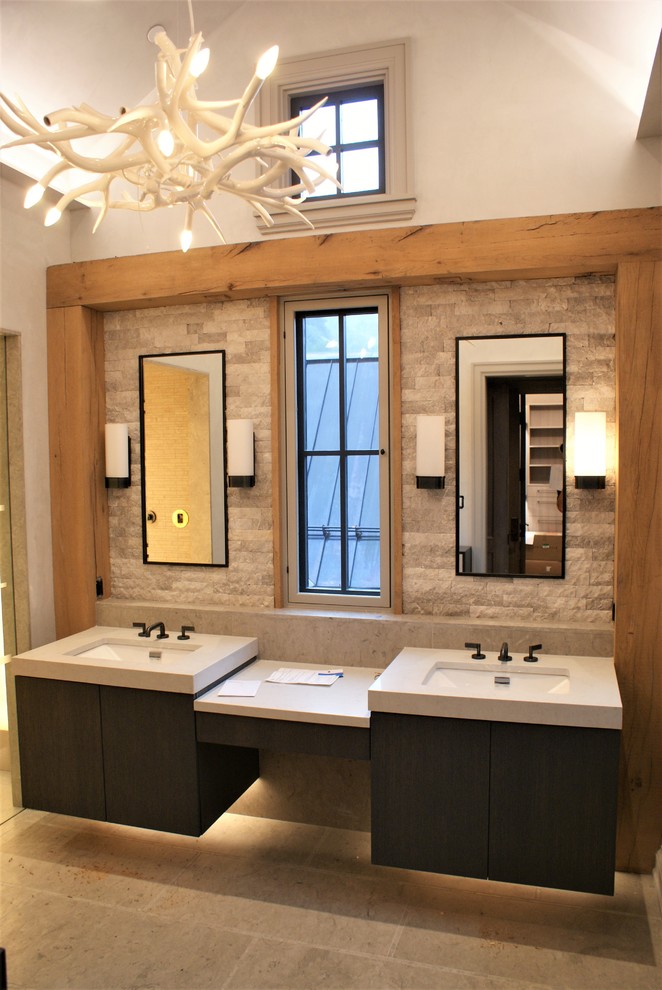 Inspiration for a mid-sized modern master bathroom in Denver with flat-panel cabinets, dark wood cabinets, an undermount sink, beige walls and porcelain floors.