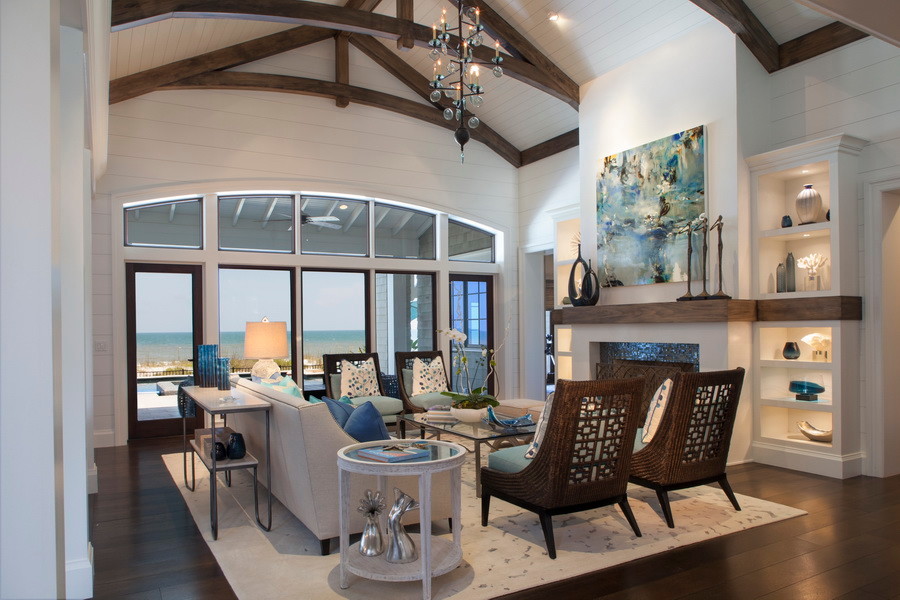 Large beach style open concept living room in Jacksonville with white walls, dark hardwood floors, a standard fireplace and a tile fireplace surround.