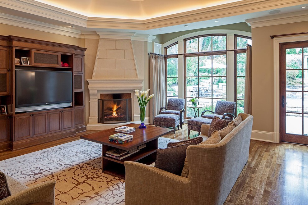 This is an example of a traditional living room in Toronto with a corner fireplace.