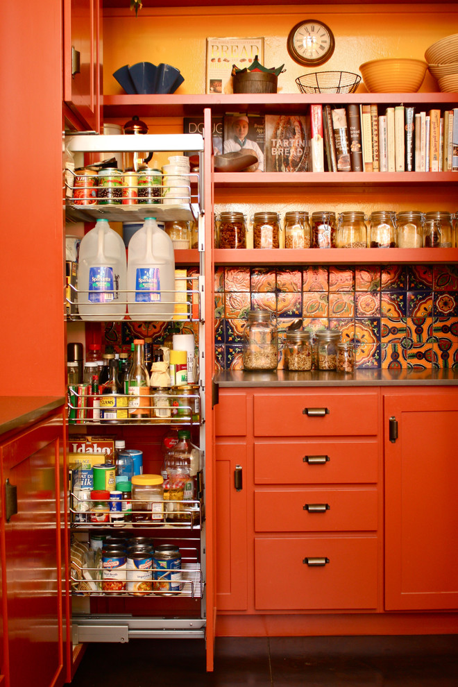 Design ideas for a kitchen in Santa Barbara with orange cabinets.