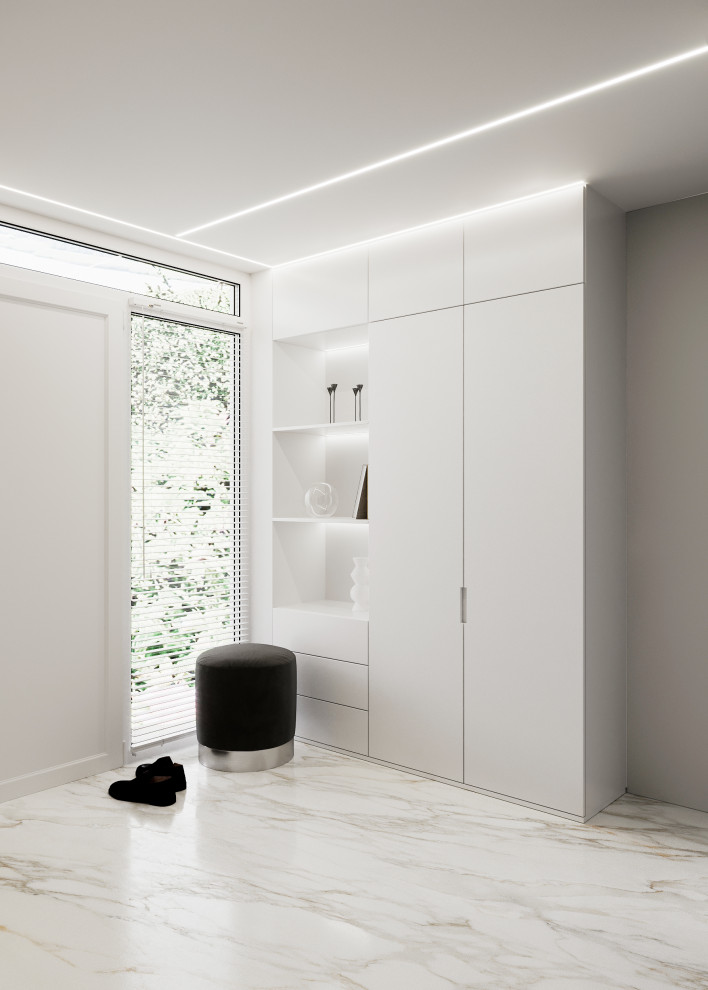 На фото: коридор среднего размера в стиле модернизм с белыми стенами, полом из керамогранита и белым полом