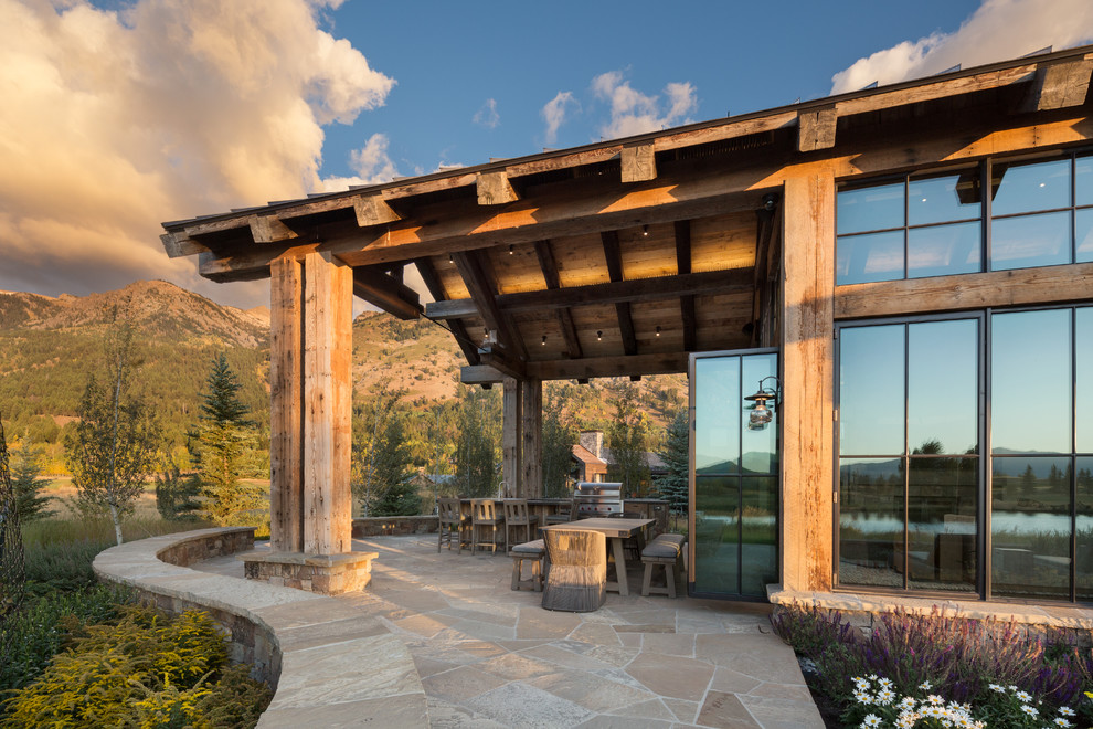 Patio - rustic patio idea in Jackson