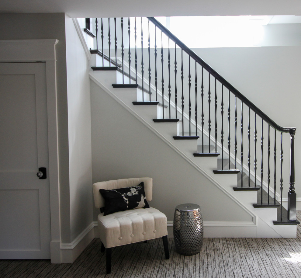 Inspiration for a large transitional wooden l-shaped mixed material railing staircase remodel in DC Metro with painted risers