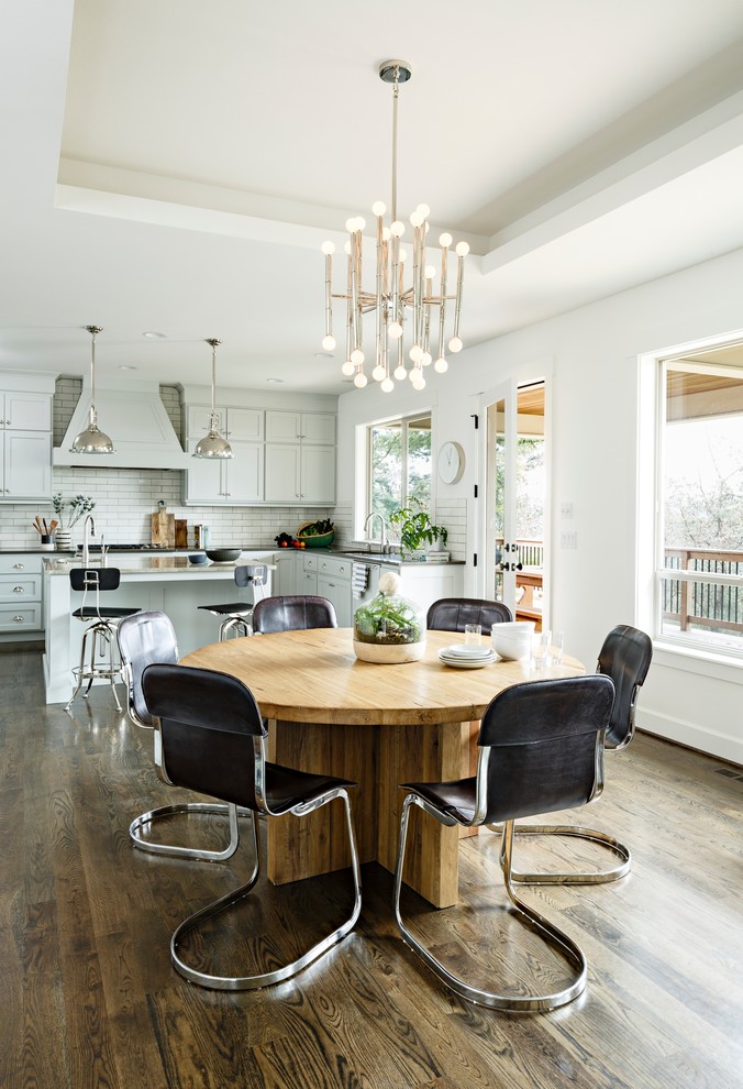 Mid-sized transitional open plan dining in Portland with white walls and dark hardwood floors.