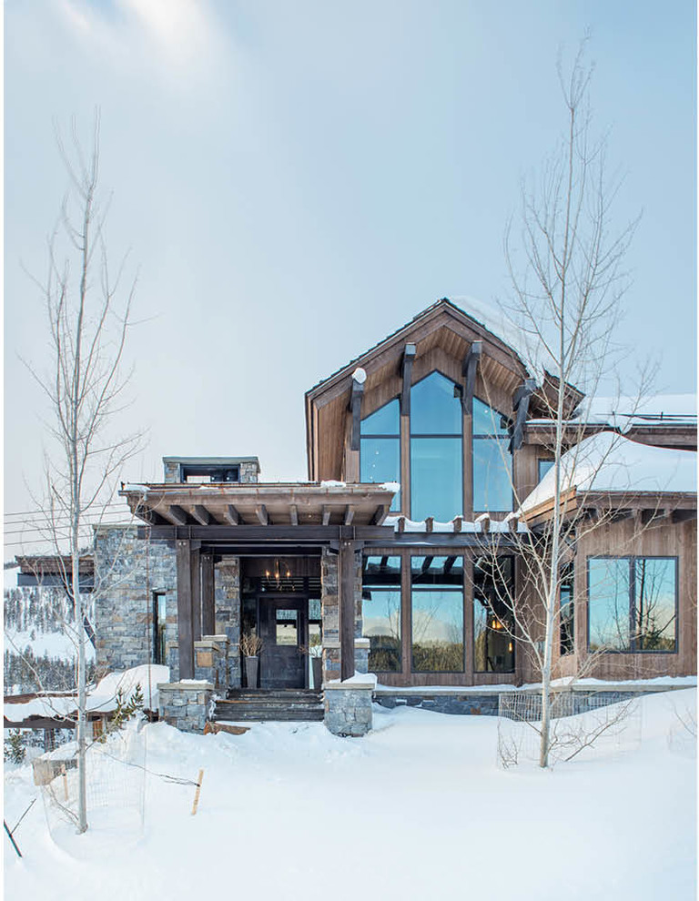Mountain Peek - Mountain Peek is a custom residence located within the Yellowstone Club in Big Sky, Montana. The layout of the home was heavily influenced by the site. Instead of building up vertically the floor plan reaches out horizontally with slight elevations between different spaces. This allowed for beautiful views from every space and also gave us the ability to play with roof heights for each individual space. Natural stone and rustic wood are accented by steal beams and metal work throughout the home.

(photos by Whitney Kamman)