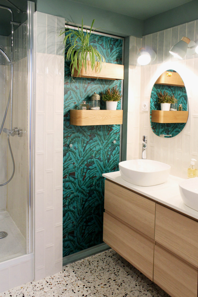 Inspiration for a contemporary bathroom in Paris with an alcove shower, green walls, terrazzo floors and a drop-in sink.