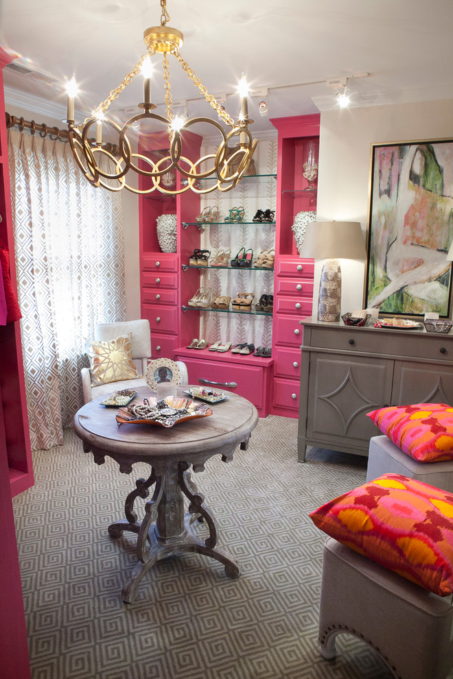 Inspiration for a mid-sized eclectic women's dressing room in Charleston with raised-panel cabinets, red cabinets and carpet.