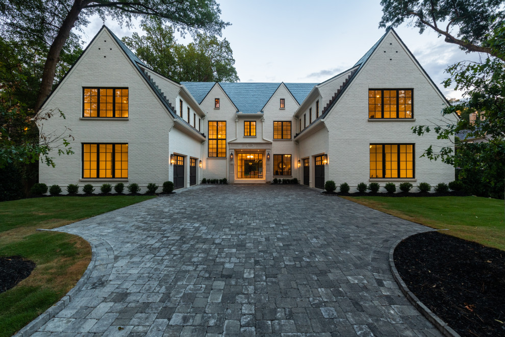 Example of a transitional white four-story brick house exterior design in Atlanta
