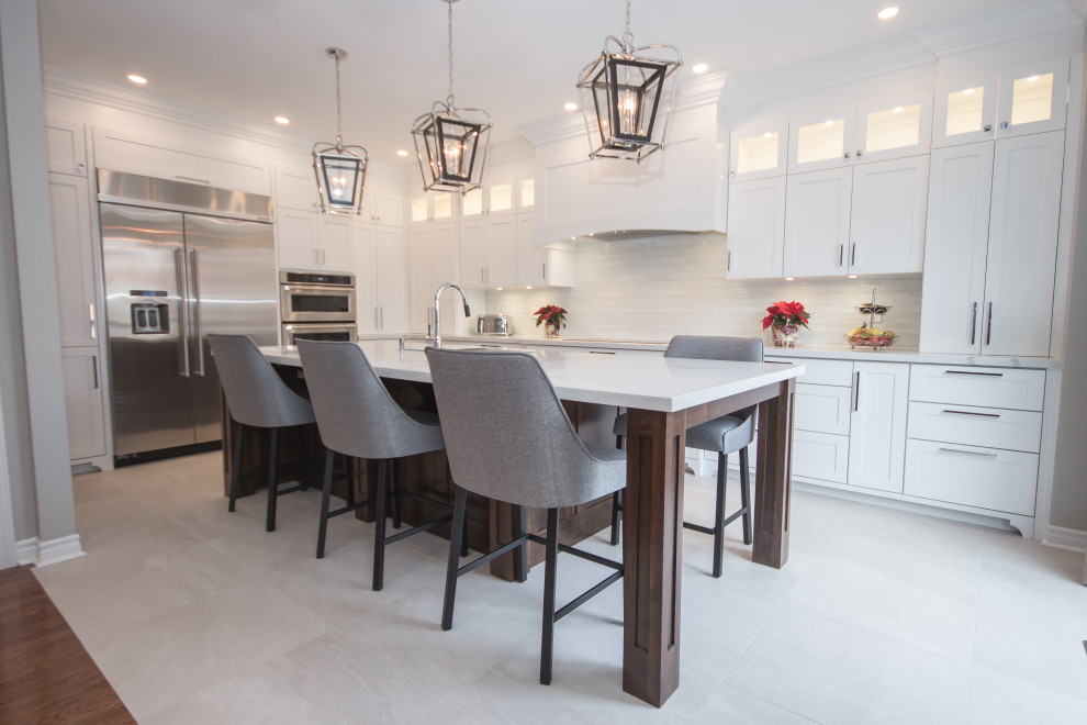 Example of a transitional kitchen design in Toronto