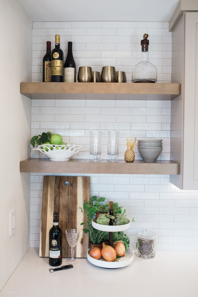 Small transitional galley porcelain tile and beige floor open concept kitchen photo in Orange County with a double-bowl sink, shaker cabinets, beige cabinets, quartz countertops, white backsplash, subway tile backsplash, stainless steel appliances, no island and white countertops