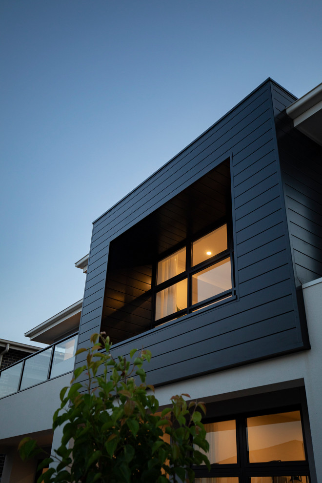 Example of a trendy exterior home design in Sydney