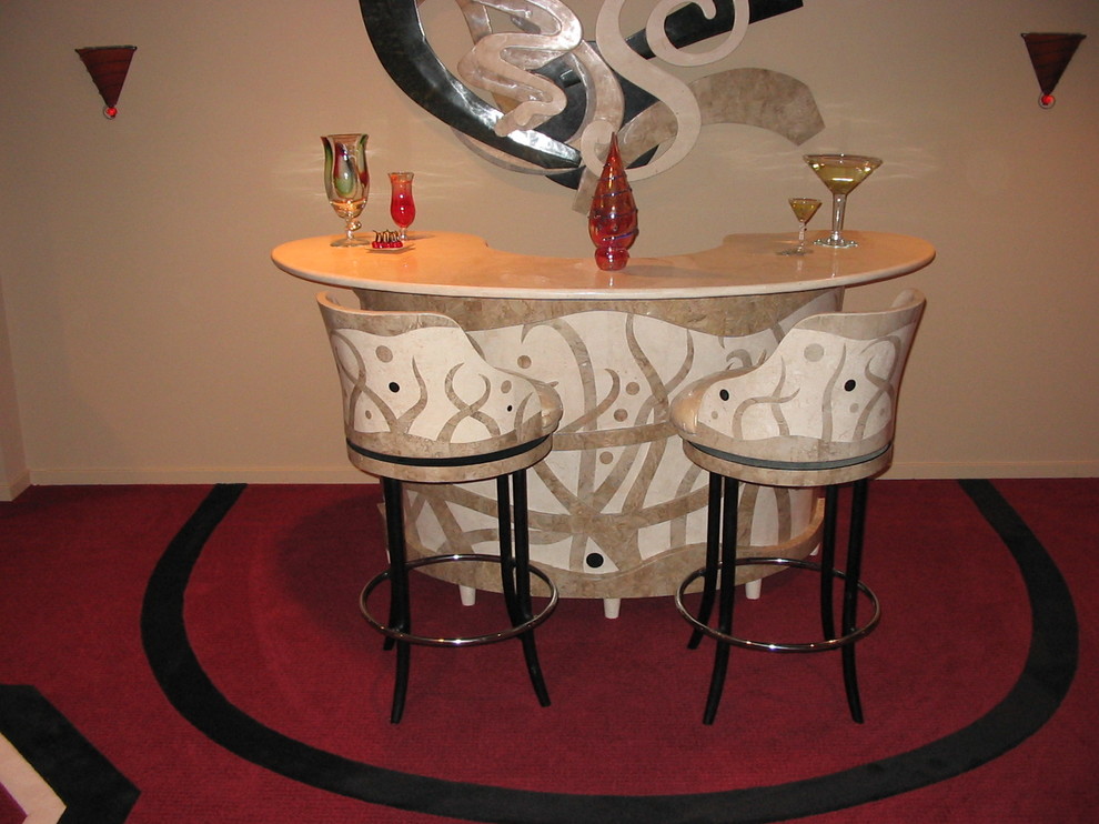 Photo of a mid-sized traditional u-shaped seated home bar in New York with carpet and marble benchtops.