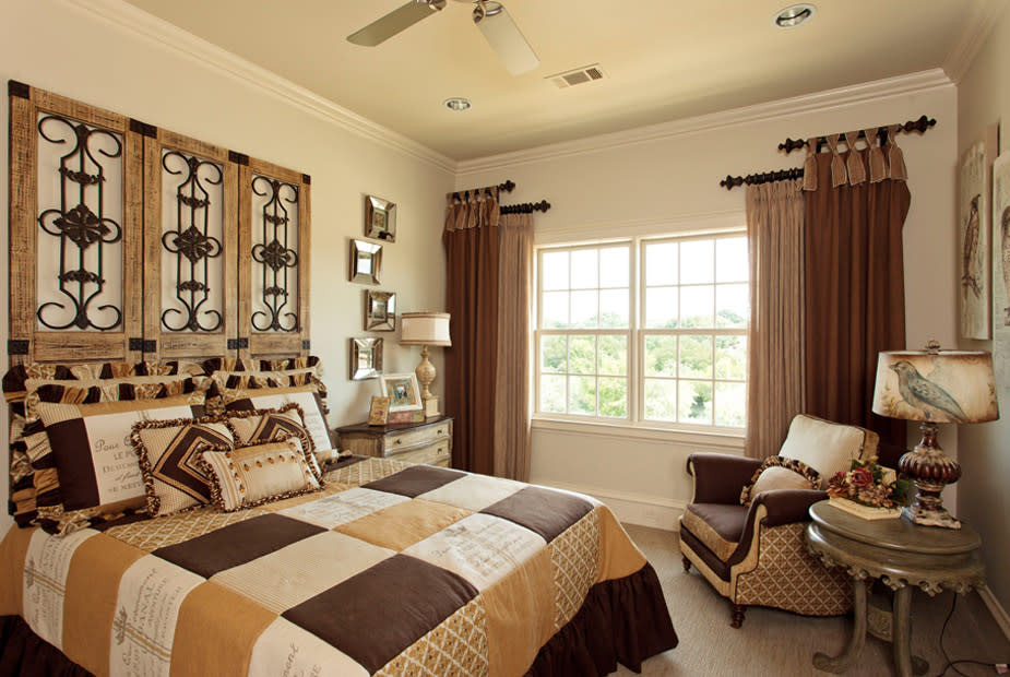 This is an example of a transitional guest bedroom in Dallas with beige walls, carpet and beige floor.
