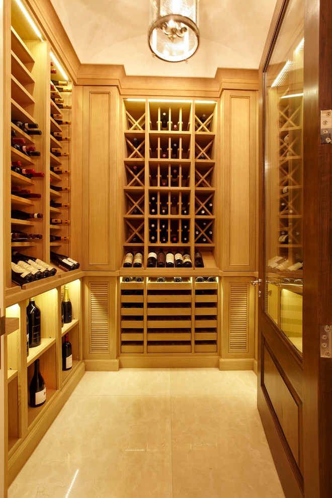 Large transitional wine cellar in Toronto with storage racks and yellow floor.