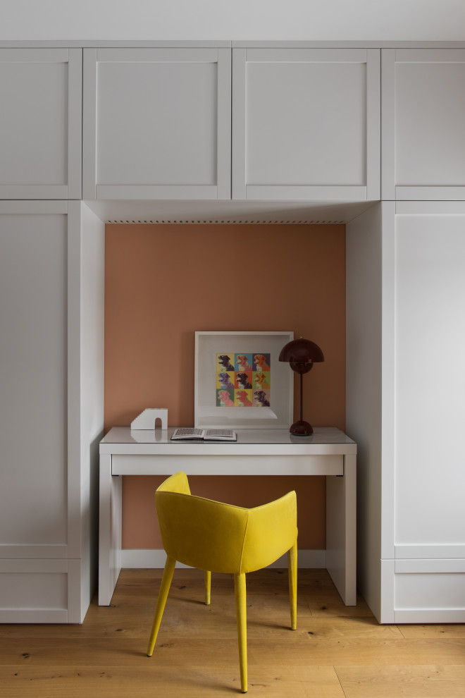 Inspiration for a mid-sized contemporary kids' room for girls in Moscow with orange walls, medium hardwood floors, beige floor and recessed.